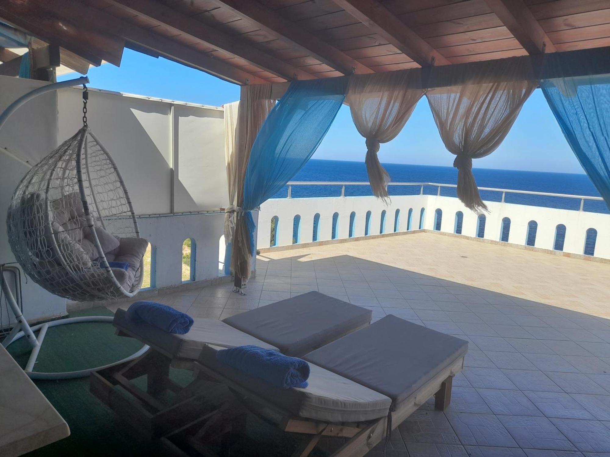 Delfini Aparthotel Akhladheri Bagian luar foto